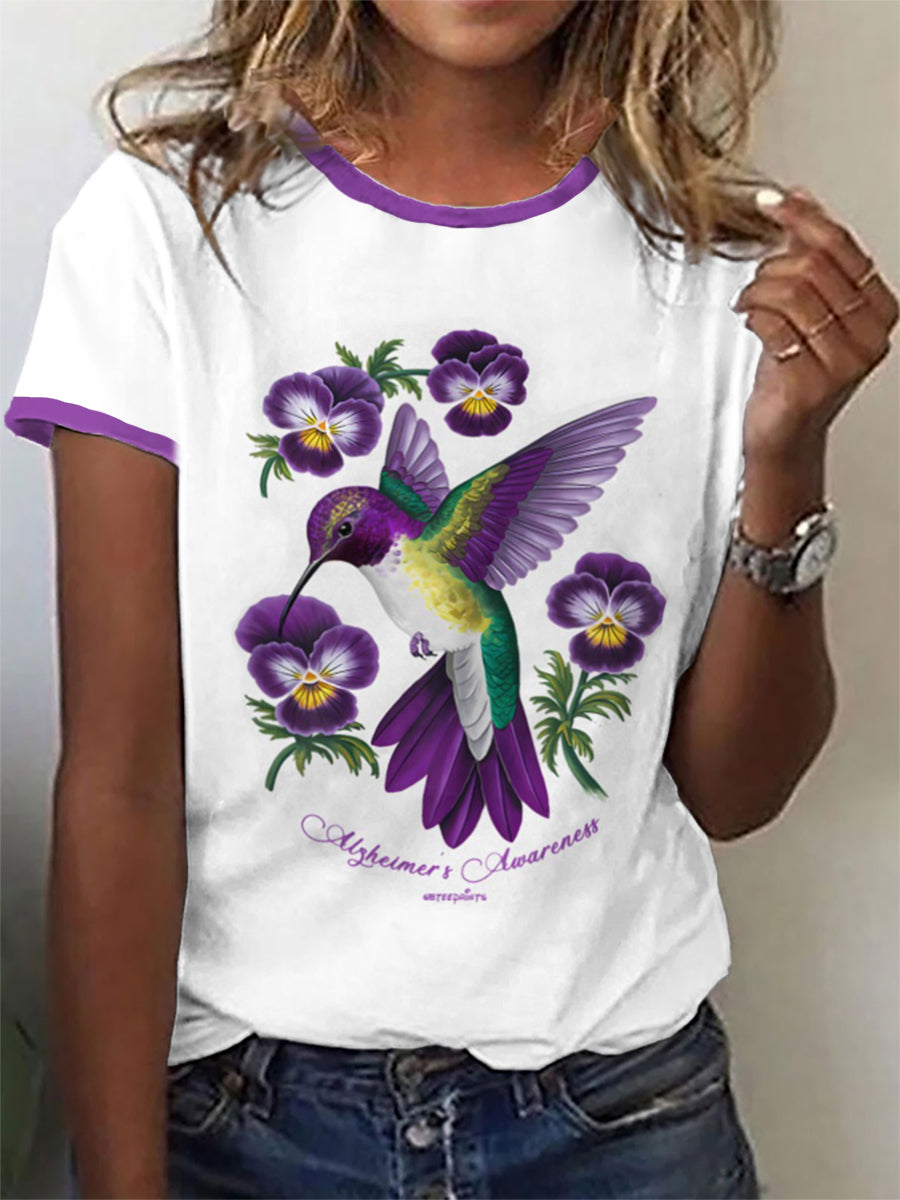 Women's Hummingbird Holding Purple Pansy Purple Alzheimer Awareness T-Shirt